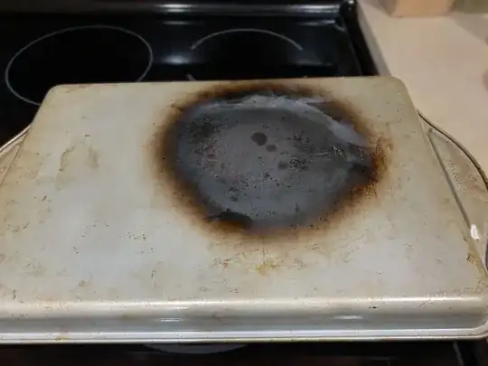 burned baking sheet, flipped over