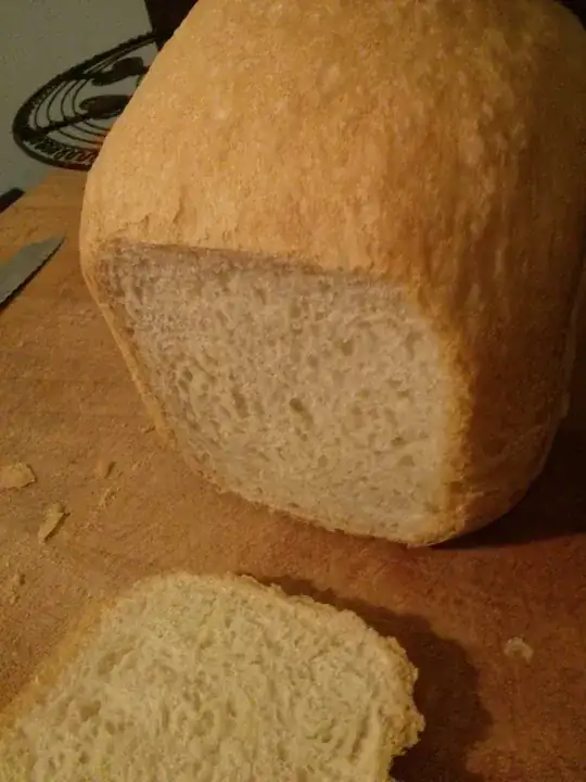 A white French loaf made with no salt, which looks similar to a 'normal' loaf