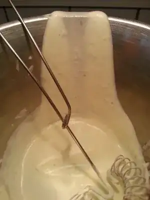 Bowl, whisk and cream with dots