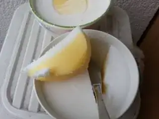 Ghee turned white being exposed to light and air