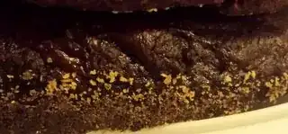 breadcrumbs on chocolate cake