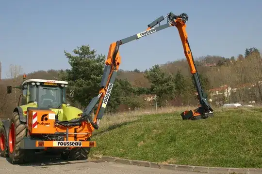 Tractor boom mower