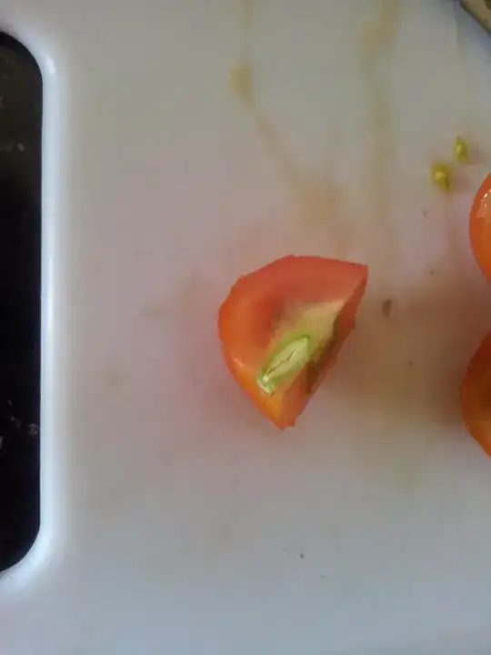 Cherry tomatoe with green in center