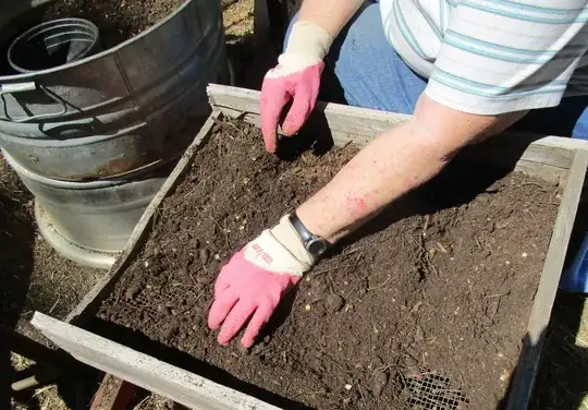 Picking out junk in the compost/soil and running through a 1/4 inch mesh