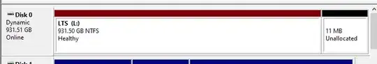 Disk Management showing 11mb of unallocated space at the end of the disk