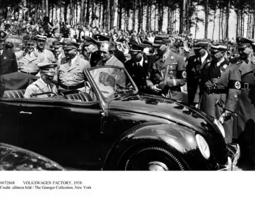 Hitler and Porsche examine a Beetle
