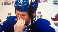 Screenshot of man sniffing