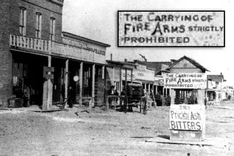 Sign purportedly in Dodge City, Kansas, circa 1878, saying "The carrying of firearms strictly prohibited"