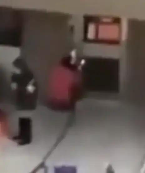 Still frame from video in The Sun article.