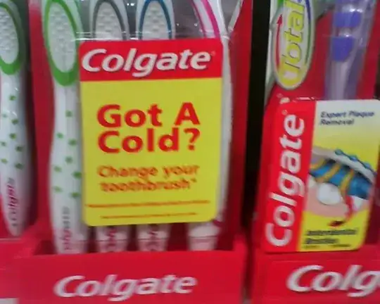 "Got a cold? Change your toothbrush." sticker on toothbrush package