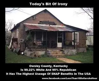 Image of house in very bad shape with text