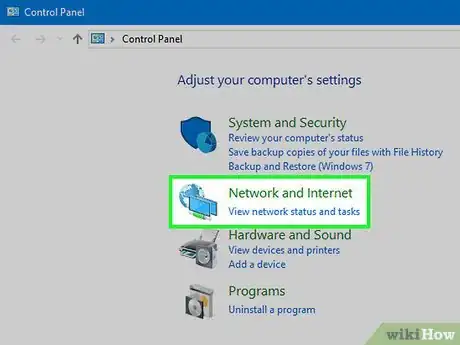 Step 4 Clique em Rede e Internet, no canto esquerdo da janela do Painel de Controle.